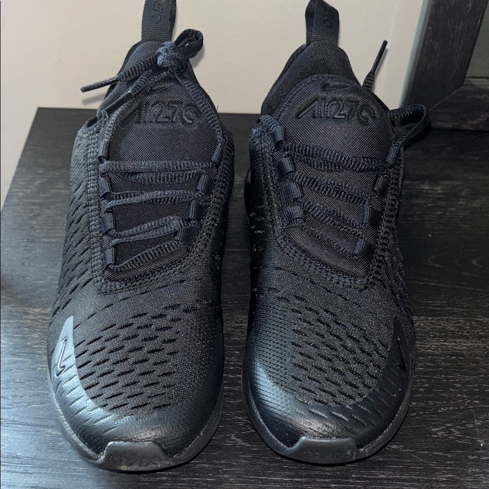 Nike Black Sneakers with Mesh Upper and Cushioned Midsole